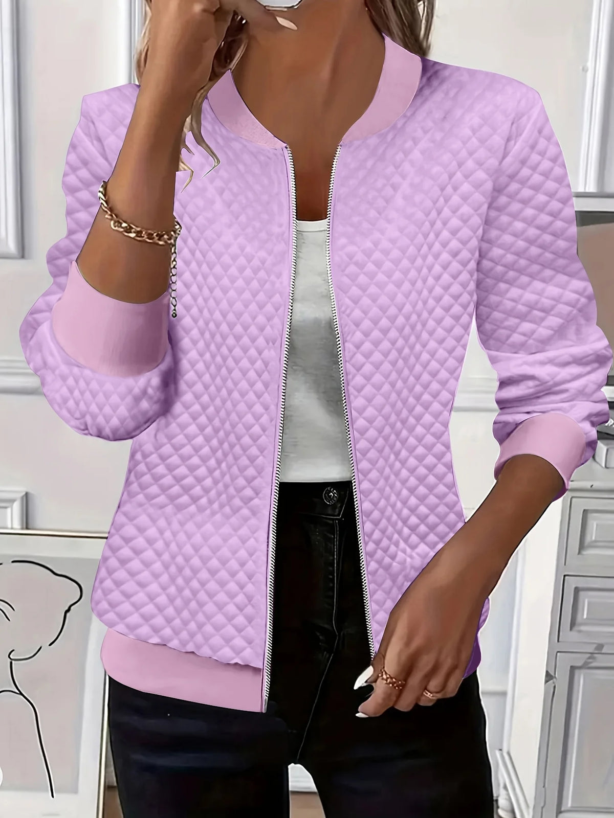 Women's blue textured quilted jacket for chilly autumn and winter days