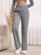 Women's black relaxed straight-leg trousers for autumn and winter