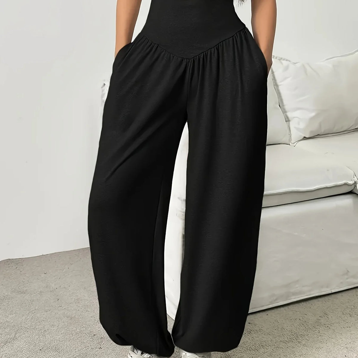 Women's black relaxed full-leg trousers for the autumn and winter season