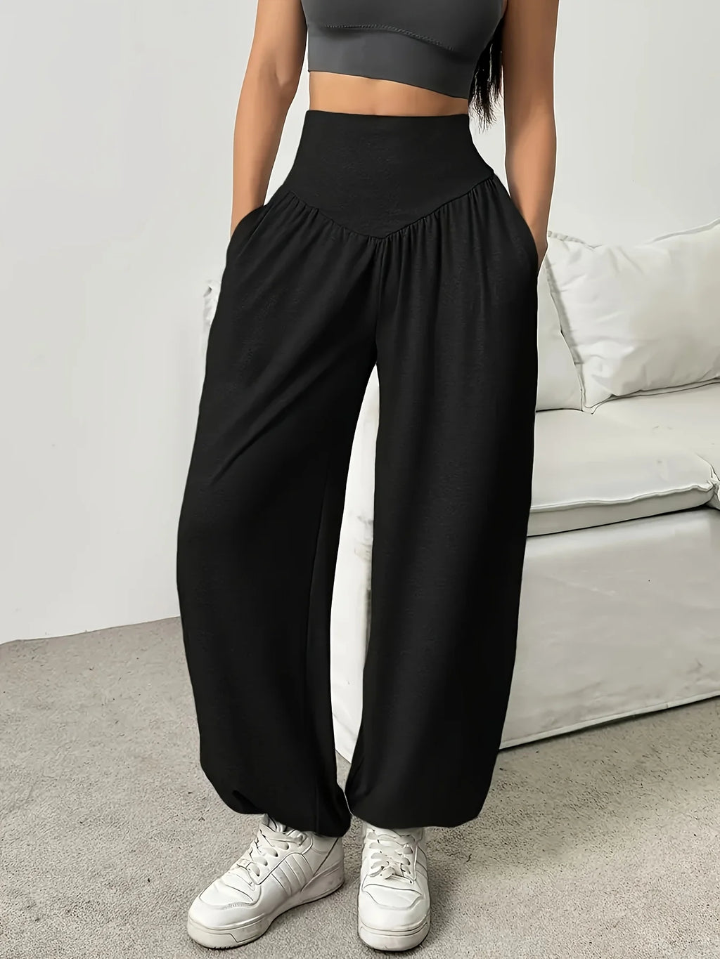 Women's black relaxed full-leg trousers for the autumn and winter season