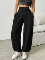 Women's black relaxed full-leg trousers for the autumn and winter season