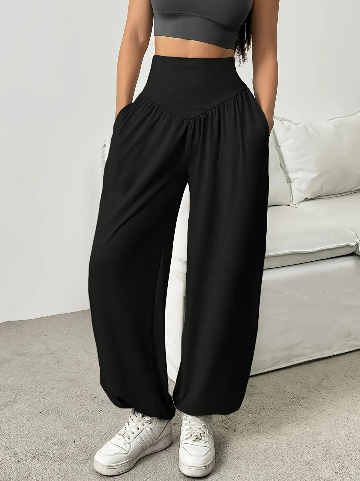 Women's black relaxed full-leg trousers for the autumn and winter season