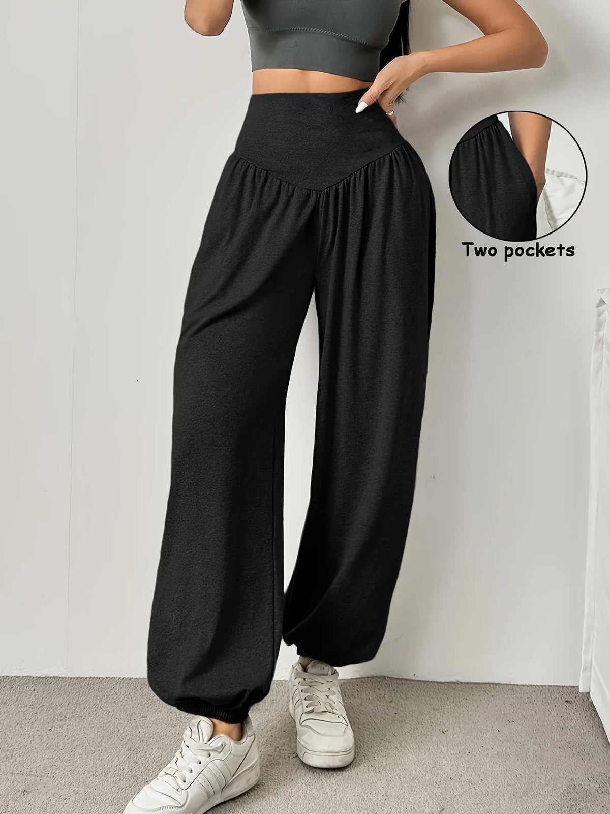 Women's black relaxed full-leg trousers for the autumn and winter season