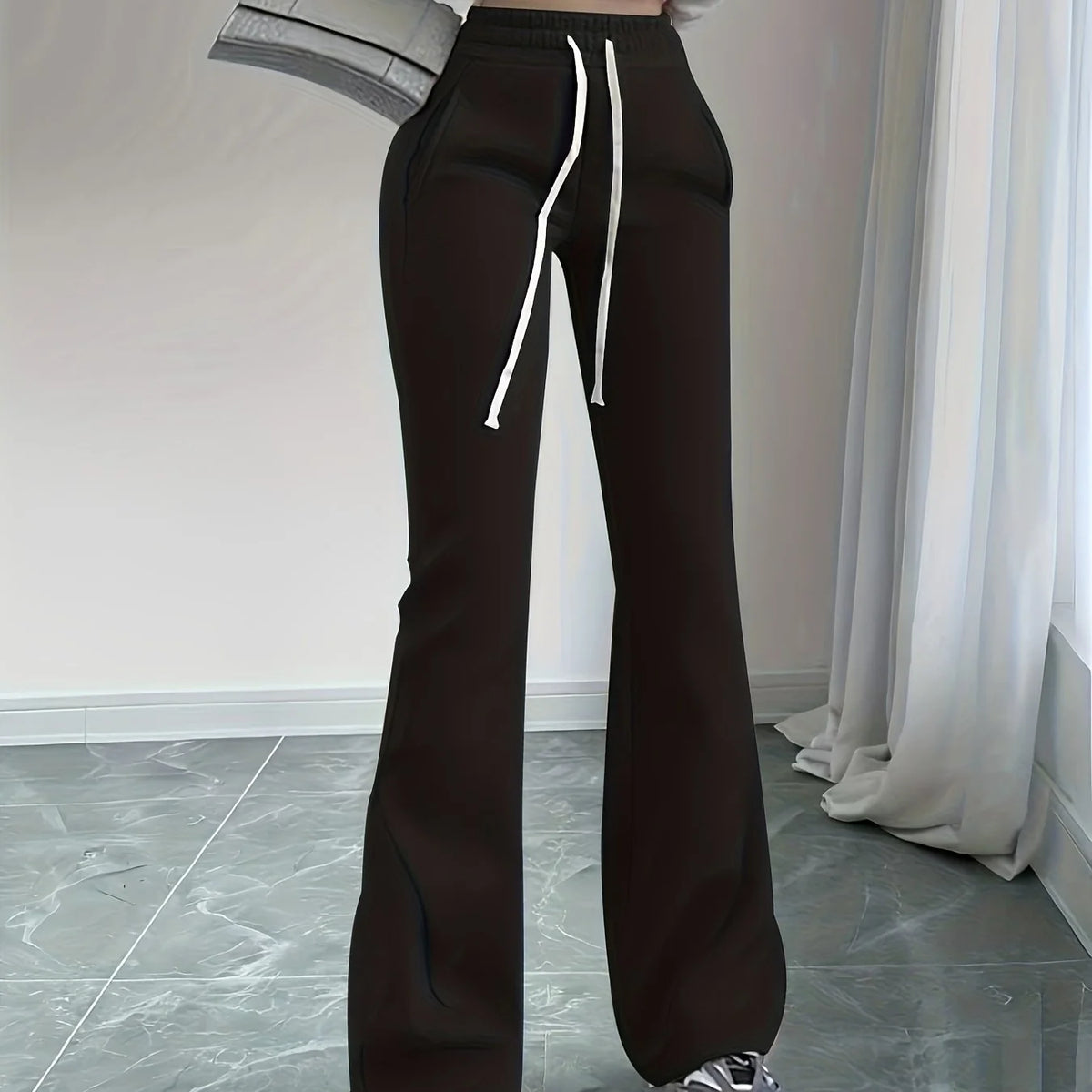Women's black high-waist flared trousers