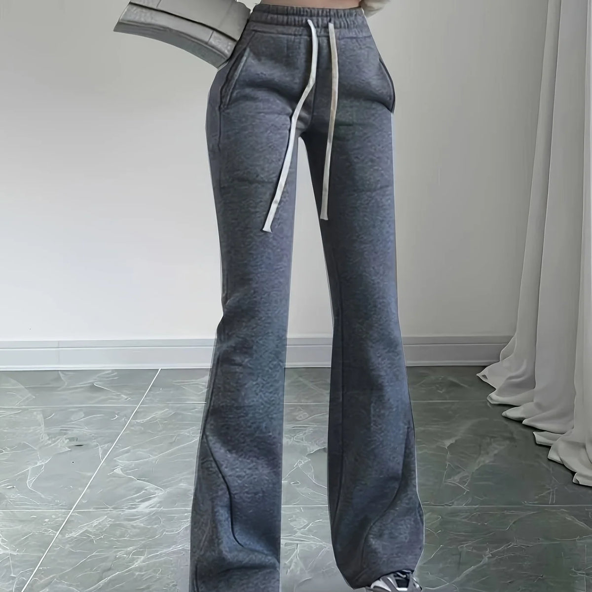 Women's black high-waist flared trousers