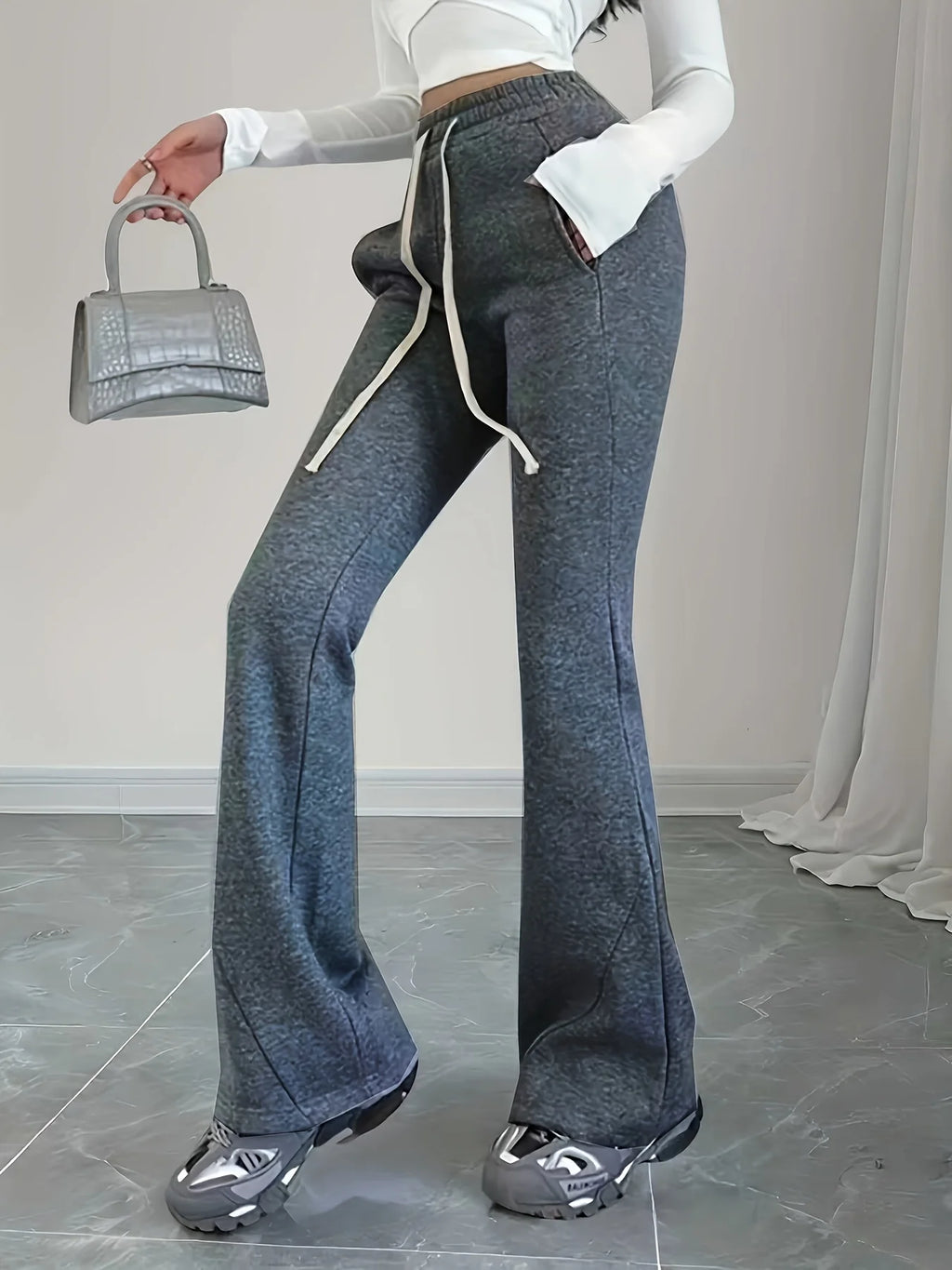 Women's black high-waist flared trousers