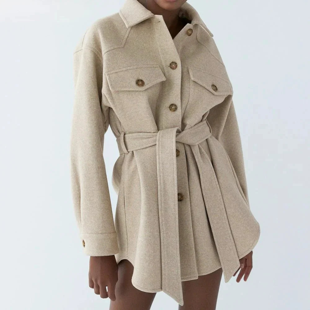 Women's beige belted shacket with chest pockets for colder days