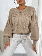Women's apricot cropped cable knit jumper with lantern sleeves for winter