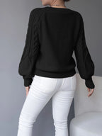 Women's black cropped cable knit jumper with lantern sleeves for winter
