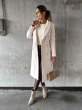 Women's beige double-breasted longline coat with button detail