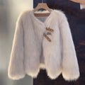 Women's beige faux fur jacket with buckle detail for autumn wear