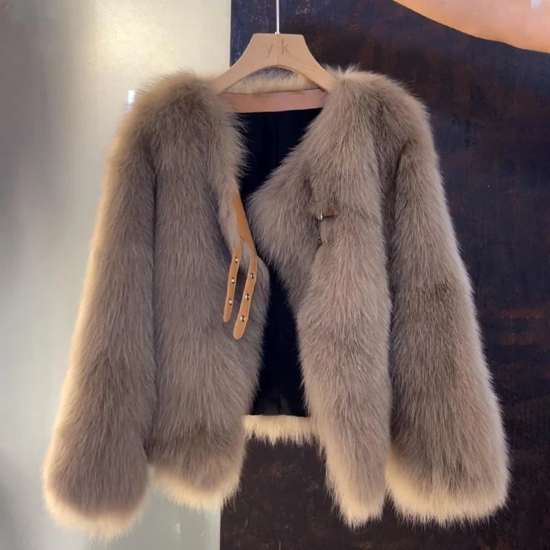 Women's beige faux fur jacket with buckle detail for autumn wear
