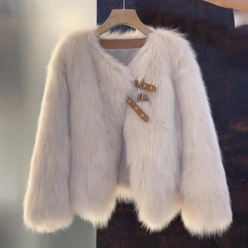 Women's beige faux fur jacket with buckle detail for autumn wear