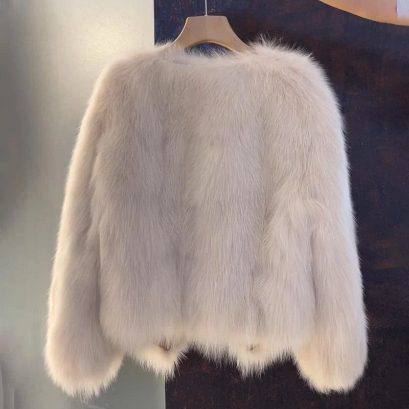 Women's beige faux fur jacket with buckle detail for autumn wear