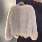 Women's beige faux fur jacket with buckle detail for autumn wear
