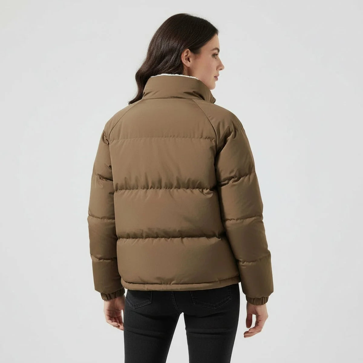 Women's green hooded puffer jacket with fleece lining for cold days