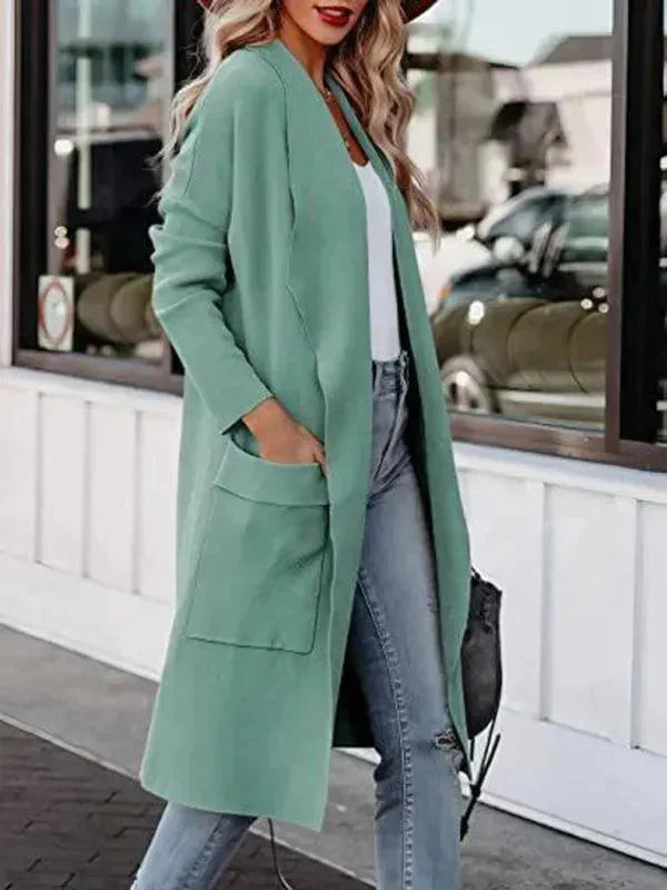 Women's green open front longline cardigan with pockets this winter