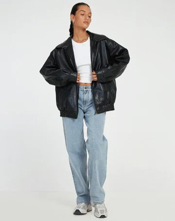 Women's black oversized leather jacket with collar for the season