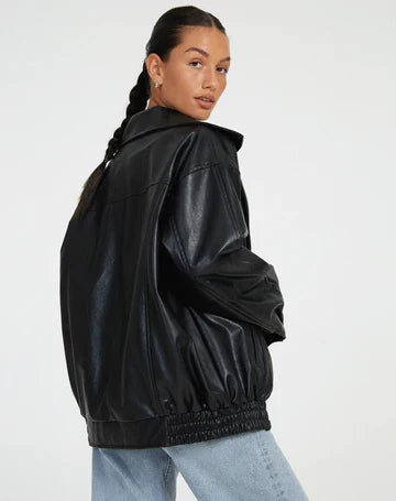 Women's black oversized leather jacket with collar for the season