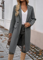 Women's grey oversized trench coat with notched lapel and belt