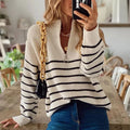 Women's beige striped ribbed jumper for cold autumn and winter days