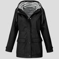 Women's black waterproof hooded raincoat with zip closure this winter